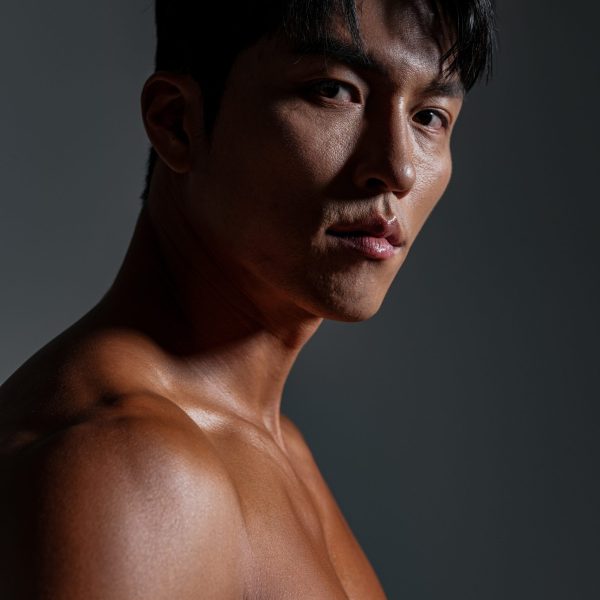 studio shot - fitness image of an Asian male